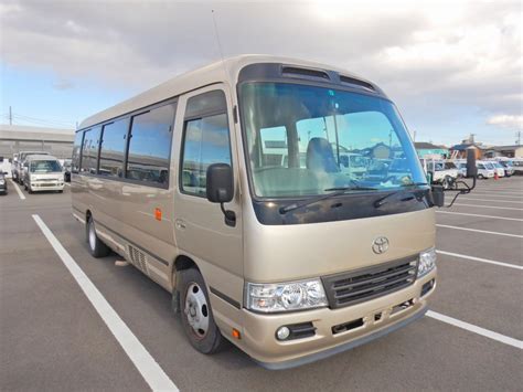 Toyota Coaster — 22 adults + 6 folding seats for mid-size groups